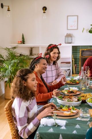 Family Celebrating Holiday Meal with Joyful Togetherness
