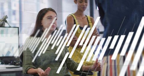Colleagues Discussing Data with Woman Gesturing amid Augmented Analytics Overlay
