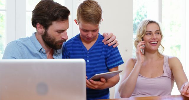 Family Enjoying Quality Time with Digital Gadgets at Home - Download Free Stock Images Pikwizard.com