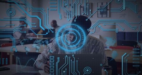 Man typing on laptop in coworking lounge with blue hud data overlay circuit visualization