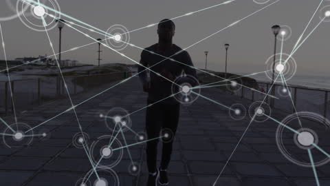 Digital Network Overlay on Man Running on Beach Promenade