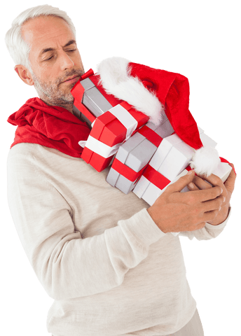 Content man holding christmas gifts wearing santa hat transparent background