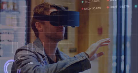 Man Engaging with Interactive Data Using VR Headset