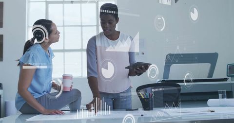 Business Colleagues Analyzing Financial Trends with Digital Analytics