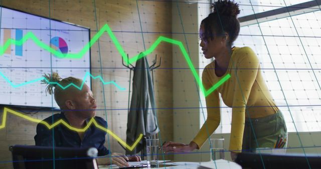 Business Colleagues Analyzing Financial Data with Graph Overlay - Download Free Stock Images Pikwizard.com