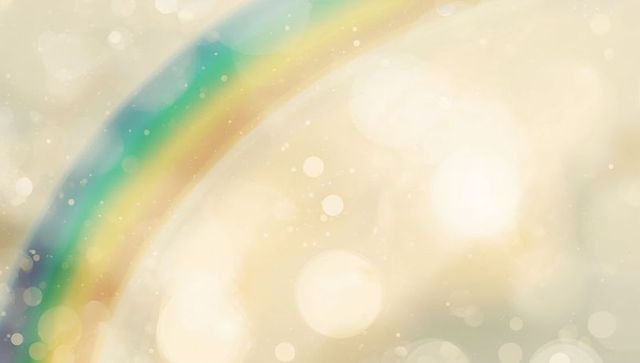 Ethereal pastel rainbow arc with soft bokeh and sparkle glow for dreamy backgrounds