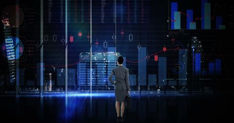 Businessman Analyzing Financial Data at Night in Downtown Office - Download Free Stock Images Pikwizard.com