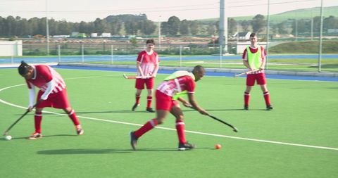 Hockey Players Practicing on Outdoor Field