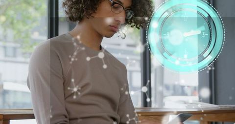 Young businessman engaged with futuristic technology interface