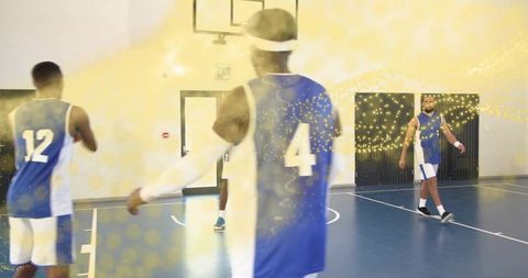 Basketball team positioning player number 4 wearing blue white jersey with sparkle effect
