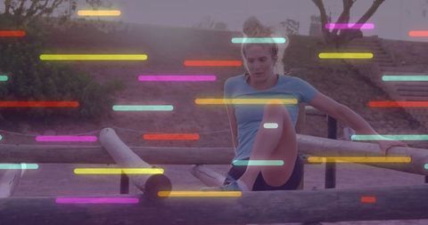 Athlete navigating obstacle course with dynamic overset light streaks