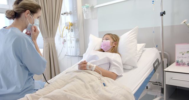 Nurse Attending Young Female Patient in Hospital Bed - Download Free Stock Images Pikwizard.com