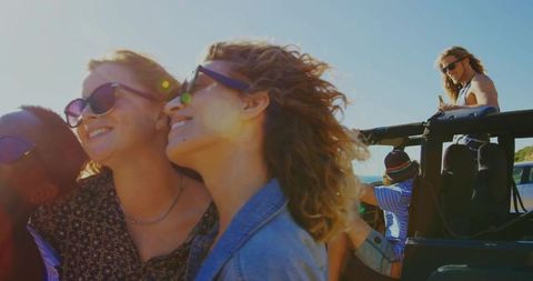 Friends on Roadtrip Enjoying Coastal Overlook Adventure