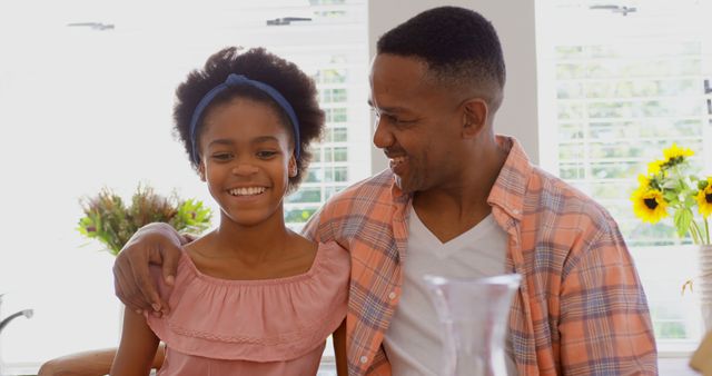 African American father bonding with daughter indoors - Download Free Stock Images Pikwizard.com