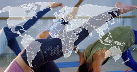 Group practicing one-leg balance yoga with world map overlay for global wellness concept