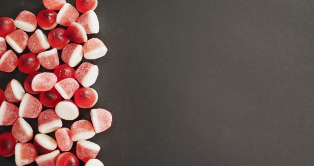 Assorted Red and White Gummy Candies on Black Background - Download Free Stock Images Pikwizard.com