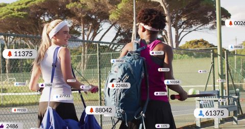 Female Tennis Players Analyzing Data and Digital Connectivity