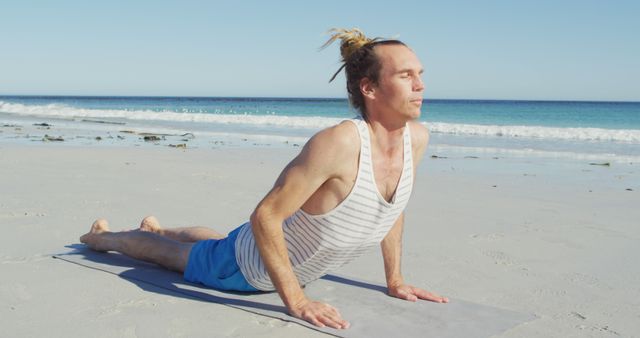 Man Practicing Yoga on Beach in Morning Sunlight - Download Free Stock Images Pikwizard.com