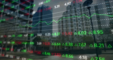 Financial Stock Data Graphs Overlaid on Blurred Urban Landscape