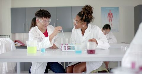 Engaged Students Conducting Science Experiment in School Laboratory - Download Free Stock Images Pikwizard.com