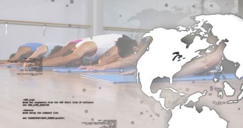 Group yoga class stretching forward bend on blue mats with global map overlay and barre