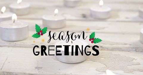 Warm holiday greetings with flickering candles