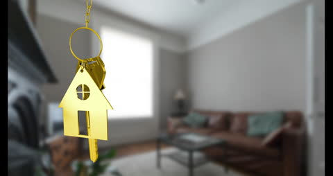 Animated Key with House Keychain in Focus Over Living Room