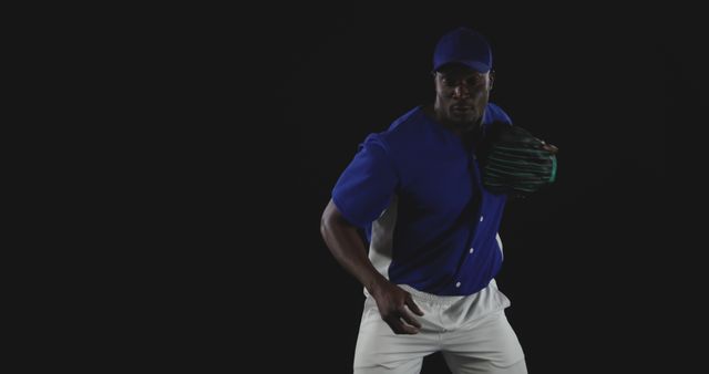 Professional Baseball Player in Action Pose on Black Background - Download Free Stock Images Pikwizard.com