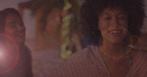 Joyful Dancing in Dimly Lit Club Setting with Sparkles