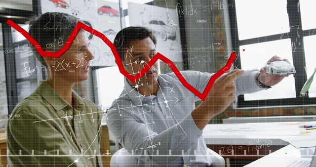 Engineers Analyzing Automotive Data with Graphical Trends on Screen - Download Free Stock Images Pikwizard.com