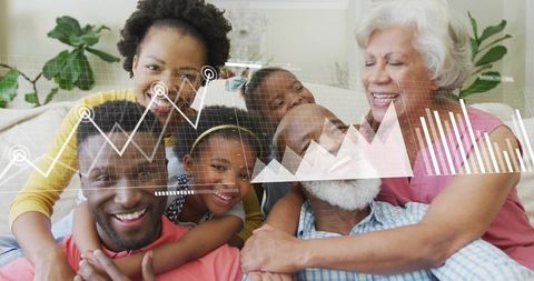 Multigenerational family embracing on couch with digital data overlay showing growth charts