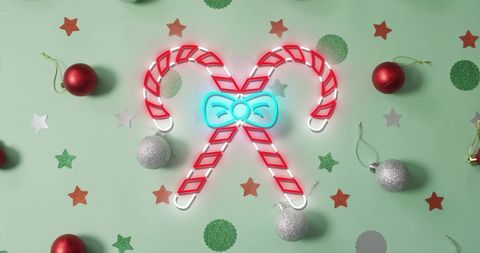 Bright Neon Candy Canes on Festive Green Background