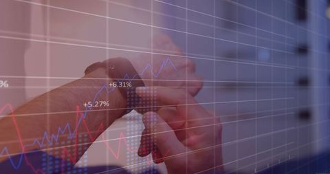 Man Uses Smartwatch with Financial Data Overlay
