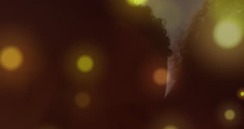 Dreamy Abstract Light Spots Over Romantic Couple at Beach