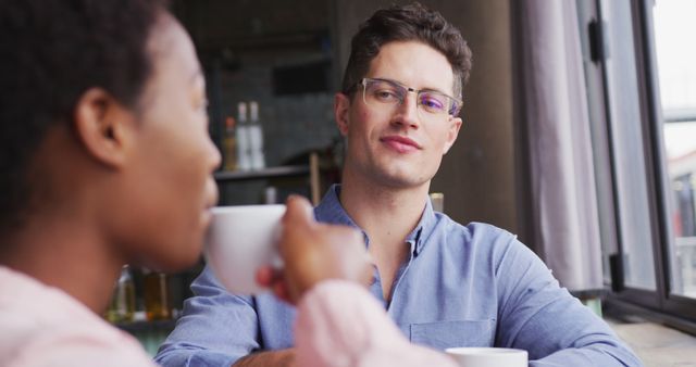 Two People Sharing Tea in Cozy Coffee Shop Setting - Download Free Stock Images Pikwizard.com