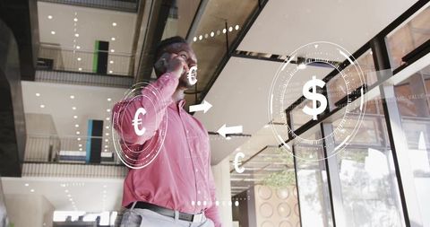 Businessman on Smartphone with Augmented Currency HUD in Modern Glass Lobby Fintech Concept