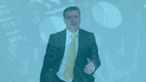 Businessman Analyzing Data With Virtual Overlay Graphics