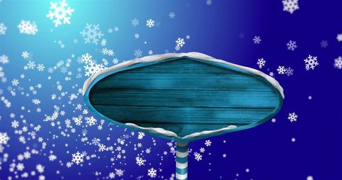 Festive winter wooden sign with falling snowflakes