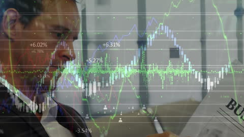 Businessman Analyzing Financial Graphs with Futuristic Data Projection