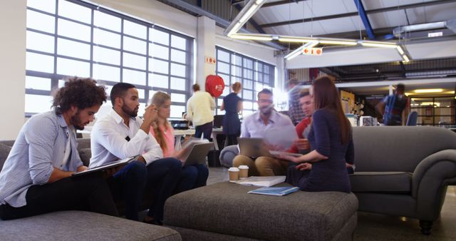 Young Professionals Having a Meeting in Modern Office Lounge - Download Free Stock Images Pikwizard.com