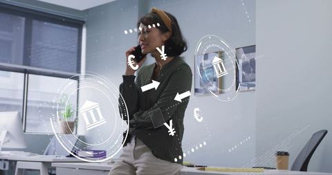 Asian professional engaged in digital banking in modern office