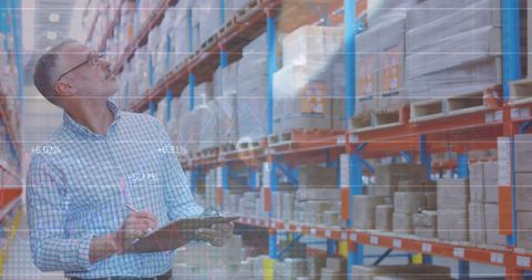 Warehouse Manager Analyzing Inventory Data Trends