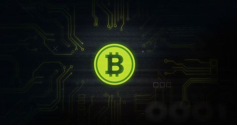 Glowing bitcoin symbol on digital circuit board background