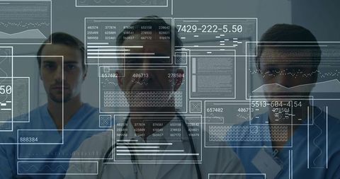 Medical Professionals Reviewing Digital Interfaces in Hospital Setting