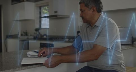 Senior Man Monitoring Blood Pressure at Home for Health Tracking