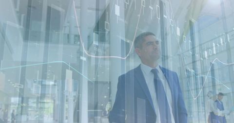 Businessman Analyzing Financial Data with Virtual Charts