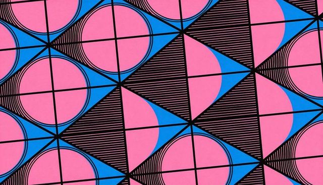 Geometric tessellation showcasing pink circles and cyan wedges on black grid