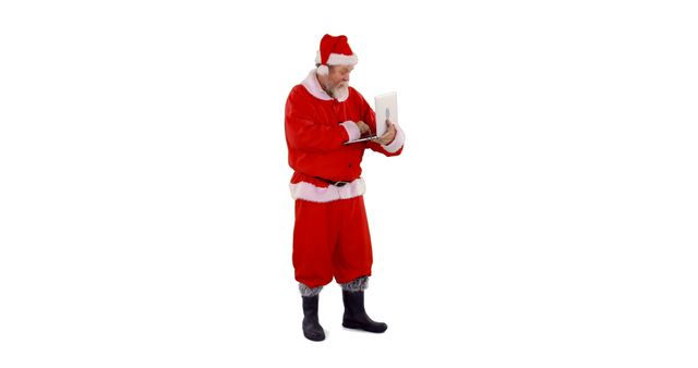 A Caucasian senior man dressed as Santa Claus is checking his list, with copy space - Download Free Stock Photos Pikwizard.com