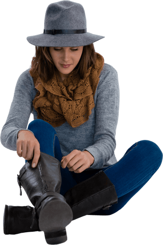 Transparent young woman sitting in stylish fall outfit