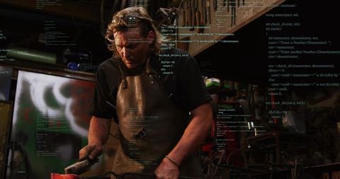 Blacksmith forging red-hot metal on anvil with code overlay in rustic industrial workshop
